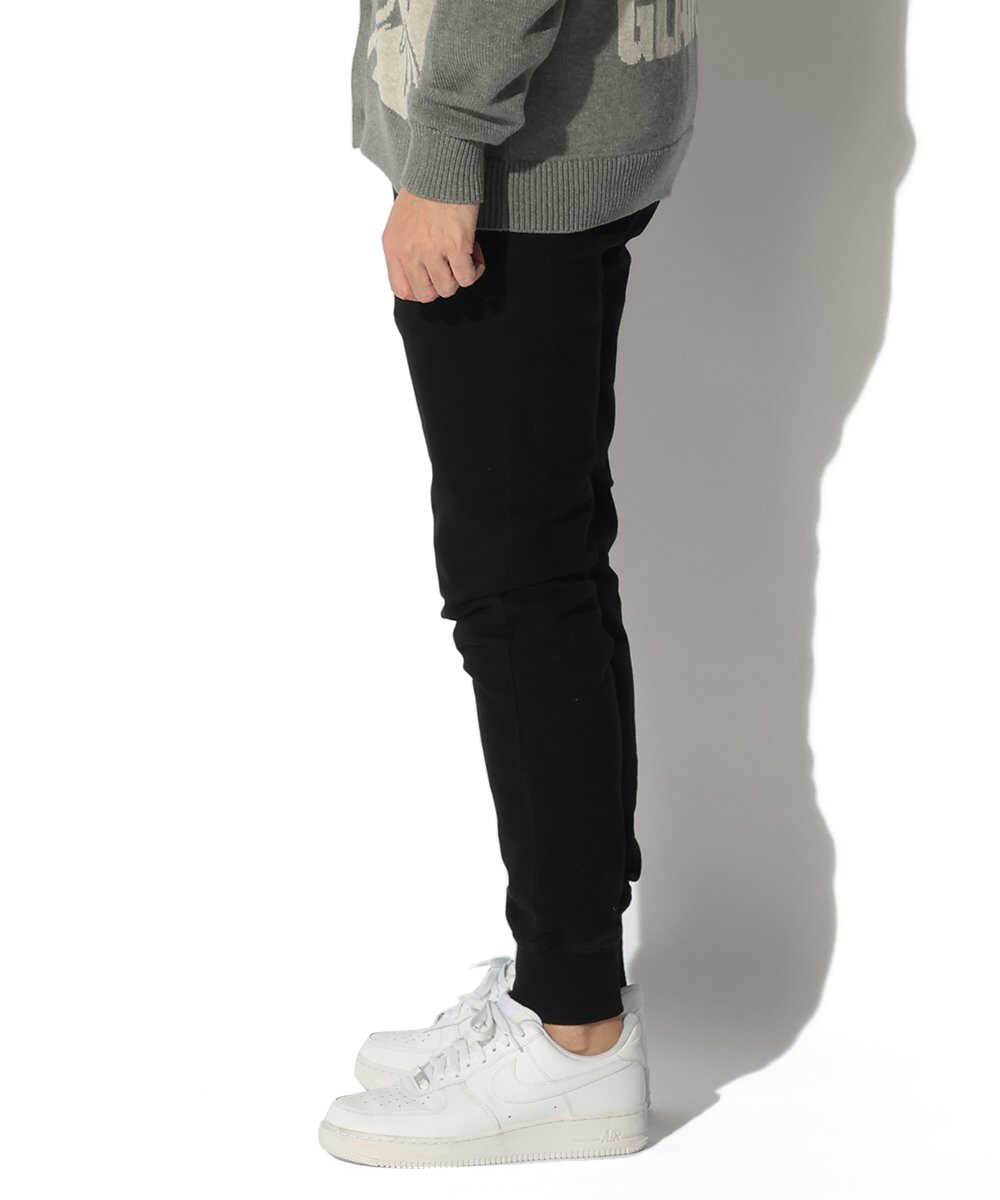 限定 テイパード デニム風 裾リブ ストレッチツイル ブラック イージーパンツ