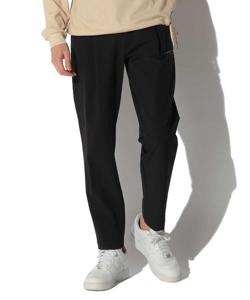 ワカニ トラウザーズ テイパードパンツ