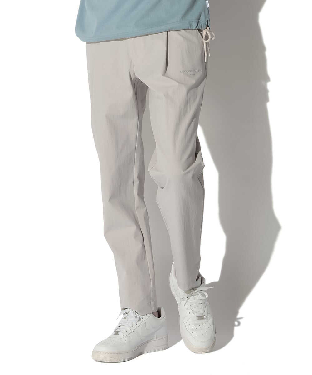 ワカニ トラウザーズ テイパードパンツ