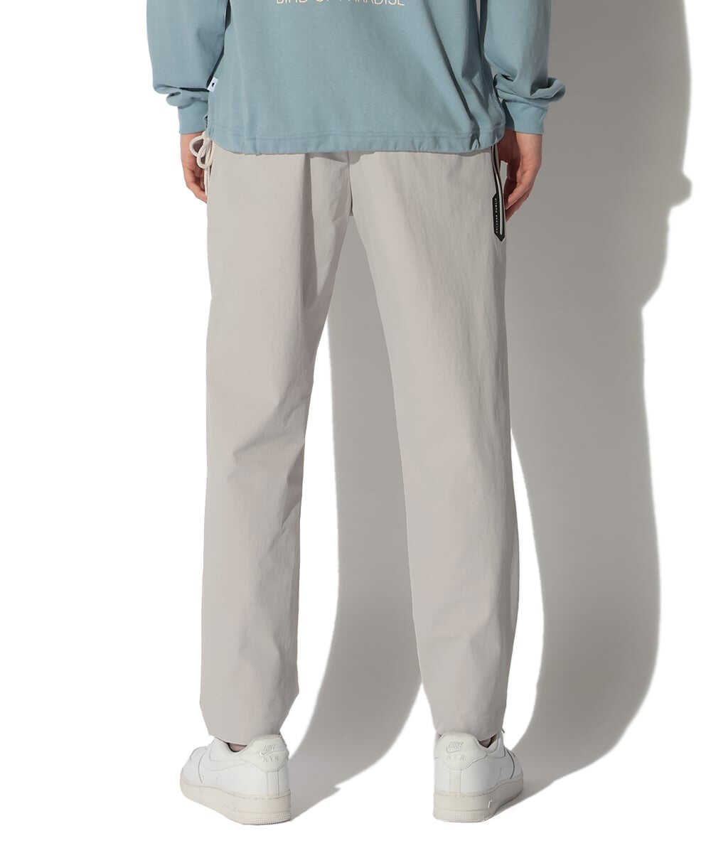 ワカニ トラウザーズ テイパードパンツ