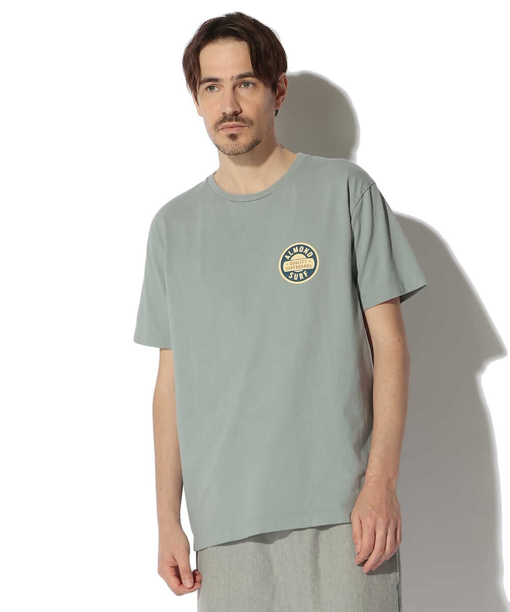 バッジロゴ バックプリント コットンTシャツ